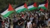 Arapski stanovnici Izraela s palestinskim zastavama na protestu kod grada Šefa Amr na severu Izraela, dan uoči obeležavanja "Nakbe", 14. maj 2024.