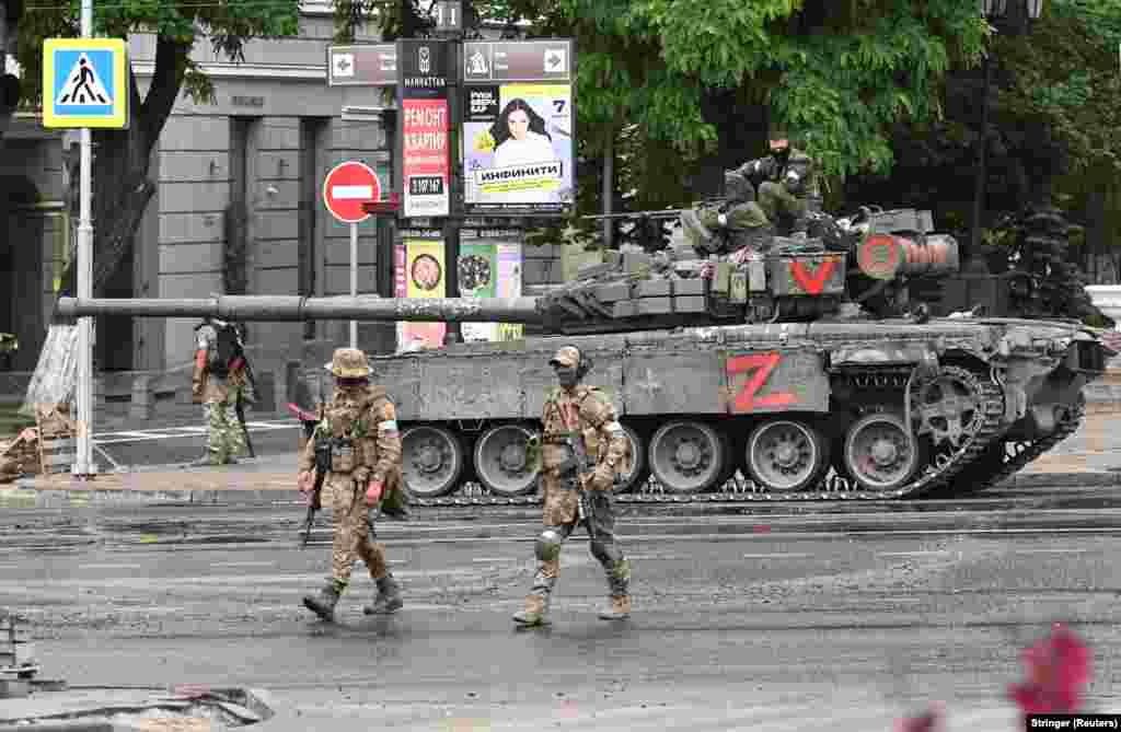 Wagner fighters are deployed in a street near the headquarters of the Southern Military District in the city of Rostov-on-Don.