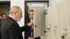 Armenia - Armavir Governor Davit Khudatian (right) looks on as Prime Minister Nikol Pashinyan inspects a newly repaired school in ths region, May 11, 2024.