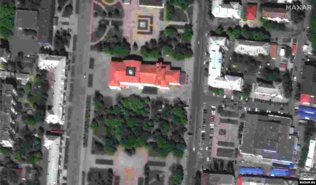 The Bakhmut Theatre and nearby shops as seen on May 8, 2022.