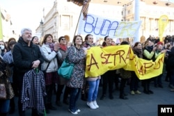 Teachers join a union protest calling for better pay and conditions in the education sector, in Budapest in March 2022.