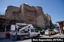 Construction crews at the foot of the fortress have started to build scaffolding to repair the walls.