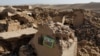 A family picture can be seen on a wall of a damaged house after an earthquake in Afghanistan's Herat Province in October 2023.