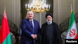 Олександр Лукашенко і президент Ірану Ебрагім Раїсі, Тегеран, 13 березня 2023 року