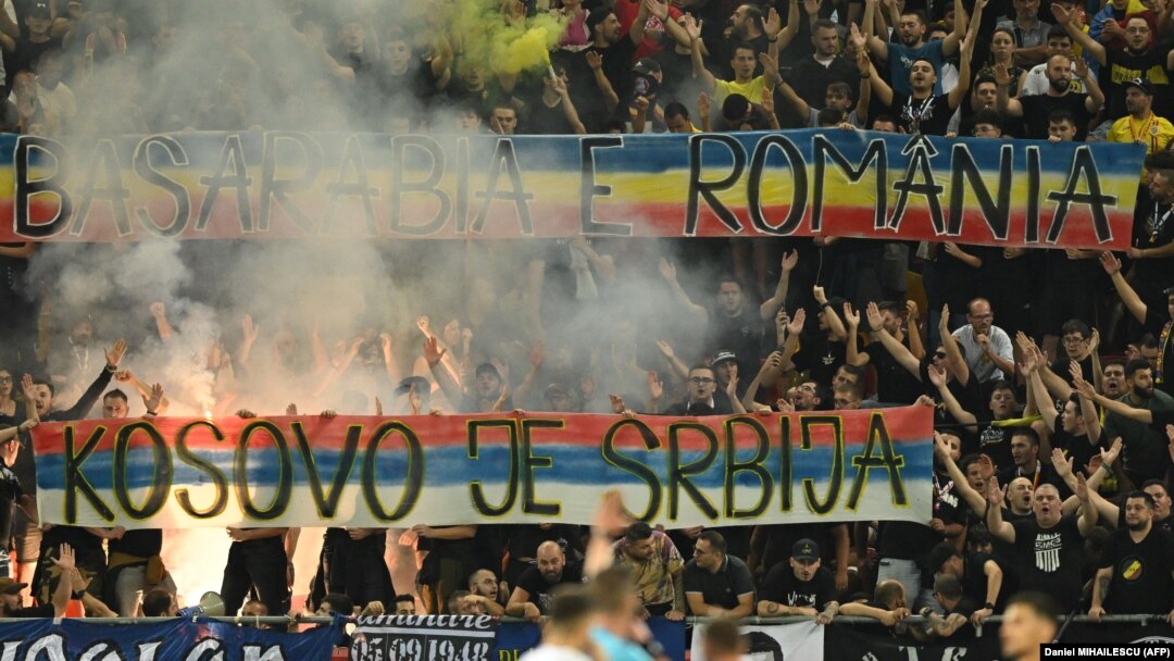 Romanian fans hold up a banner reading "Kosovo is Serbia" at the Euro 2024 qualifier match against Kosovo in Bucharest on September 12.