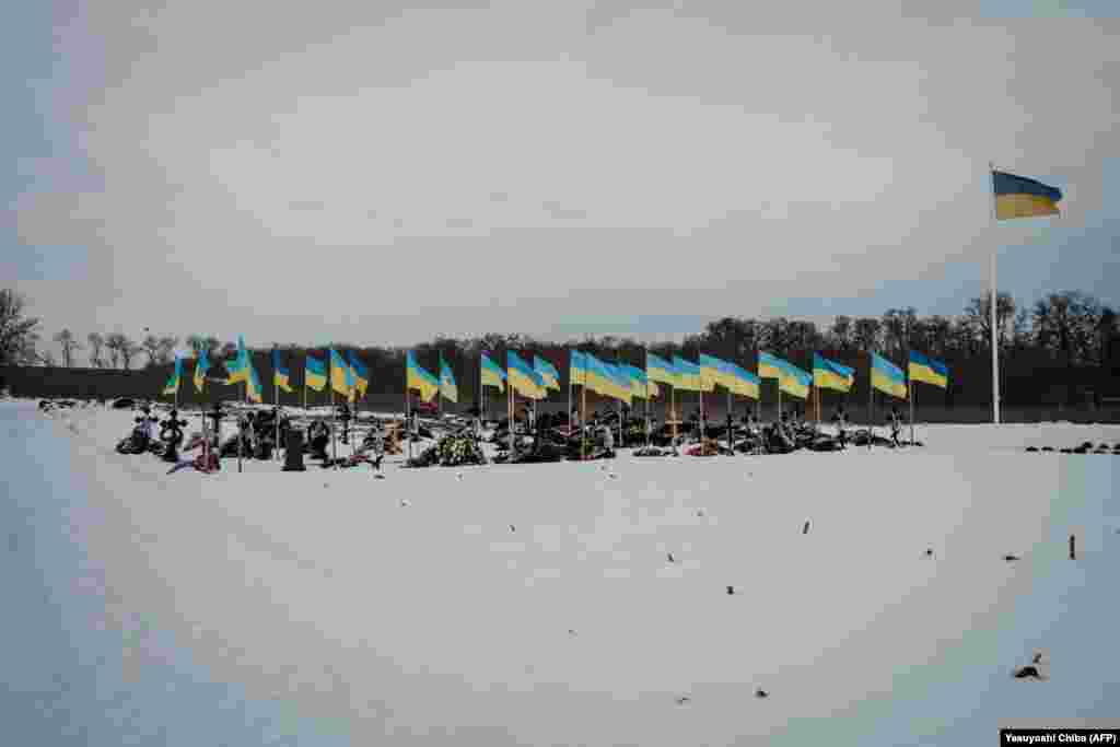 Military graves in Kramatorsk, eastern Ukraine, photographed in February 2023