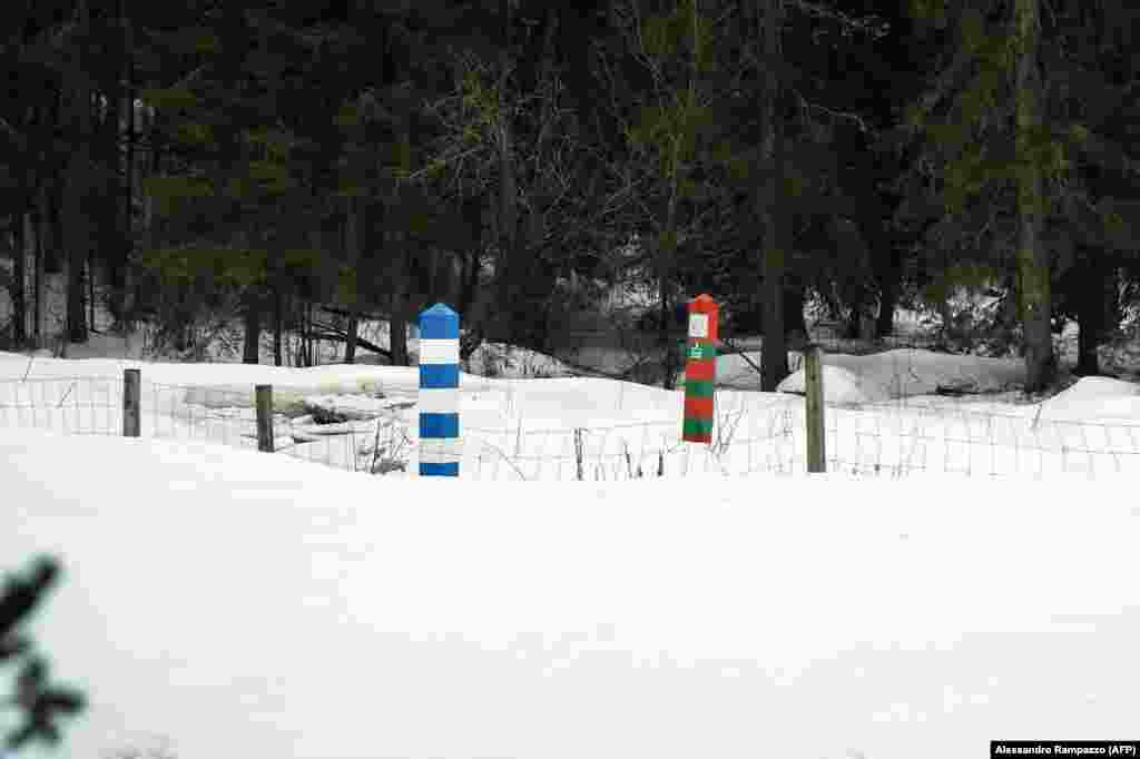 Finnish (left) and Russian border markers photographed near Imatra in southeastern Finland. After the April 4 accession of Finland to the NATO military alliance, and Kremlin threats of unspecified retaliation, Tolppanen says &quot;in this totally changed situation, Finland must have more credible and more independent border control.&rdquo; &nbsp;