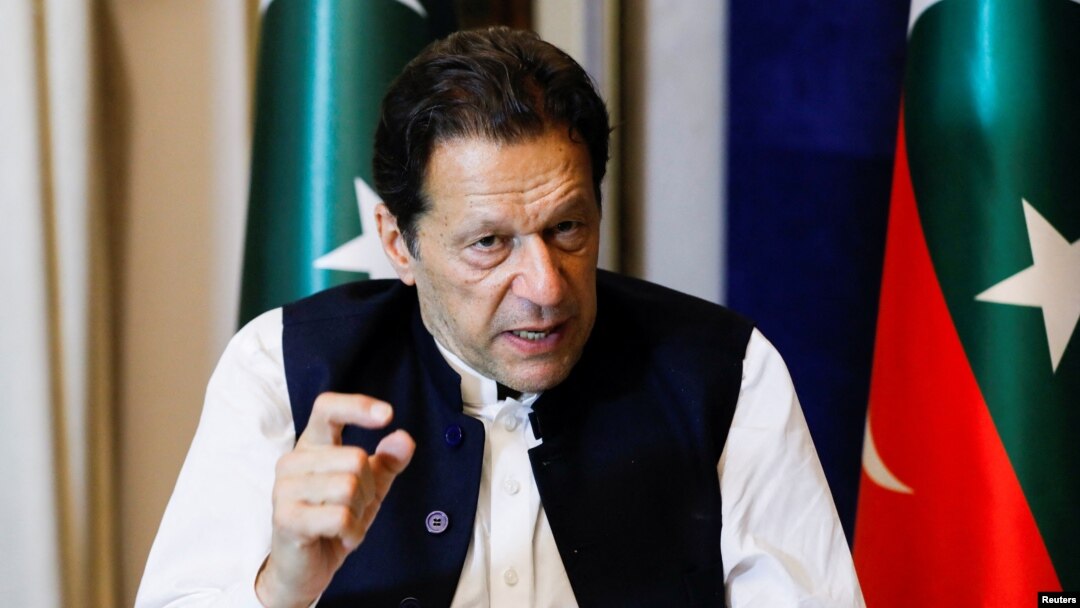 Former Pakistani Prime Minister Imran Khan speaks with reporters in Lahore on March 17.