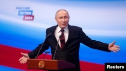 Владимир Путин по време на пресконференцията си след изборите в неделя, 17 март 2024 г. 