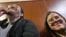 Director Vsevolod Lysovsky and his daughter Eva in court on February 27, 2023.  Moscow