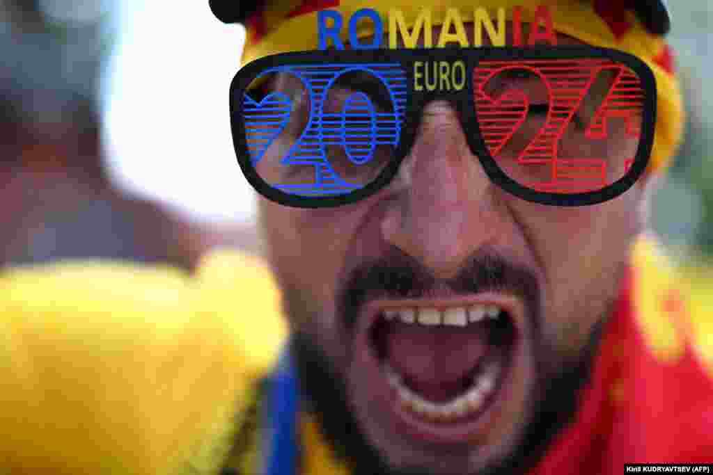 A Romania supporter poses outside the stadium prior to his country&#39;s Euro 2024 soccer game against Slovakia in Frankfurt on June 26.&nbsp;