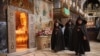 Priests inside the Cathedral of St. James in Jerusalem’s Armenian Quarter during a service on June 14.