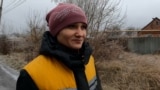 Ukraine - postal worker Hanna Povelkova wears body armor as she delivers mail near Ukraine's front lines - screen grab