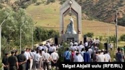People in Kyrgyzstan's Jalal-Abad region attend a commemoration on June 13 for victims of ethnic clashes in 2010.