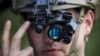 France -- A U.S. Air Force Forward air controller adjusts his night vision goggles 