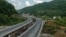 A new stretch of road cuts through the Rikoti Pass in central Georgia. The entire 51.6-kilometer project will consist of 96 bridges, 53 tunnels, and cost nearly $1 billion.
