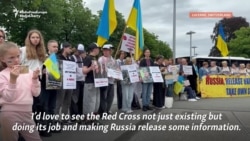 Missing Ukrainian Soldiers' Wives, Children Rally In Switzerland