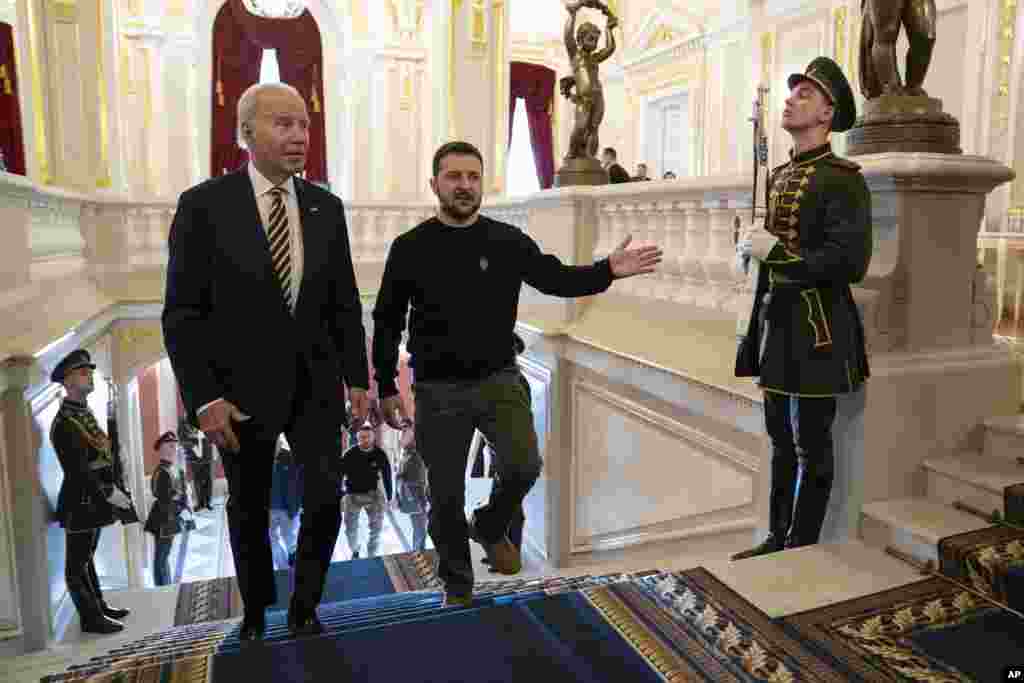 Zelenskiy (right) leads Biden upstairs at the&nbsp;Mariynskiy Palace, where the two were expected to discuss the progress of the war.&nbsp; In an earlier statement announcing the visit, Biden said he was reaffirming Washington&#39;s &quot;unwavering and unflagging commitment to Ukraine&rsquo;s democracy, sovereignty, and territorial integrity.&quot;
