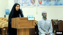 The rapper known as Tataloo in an Iranian court with his lawyer earlier this year.