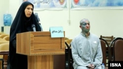 The rapper known as Tataloo in an Iranian court with his lawyer earlier this year.