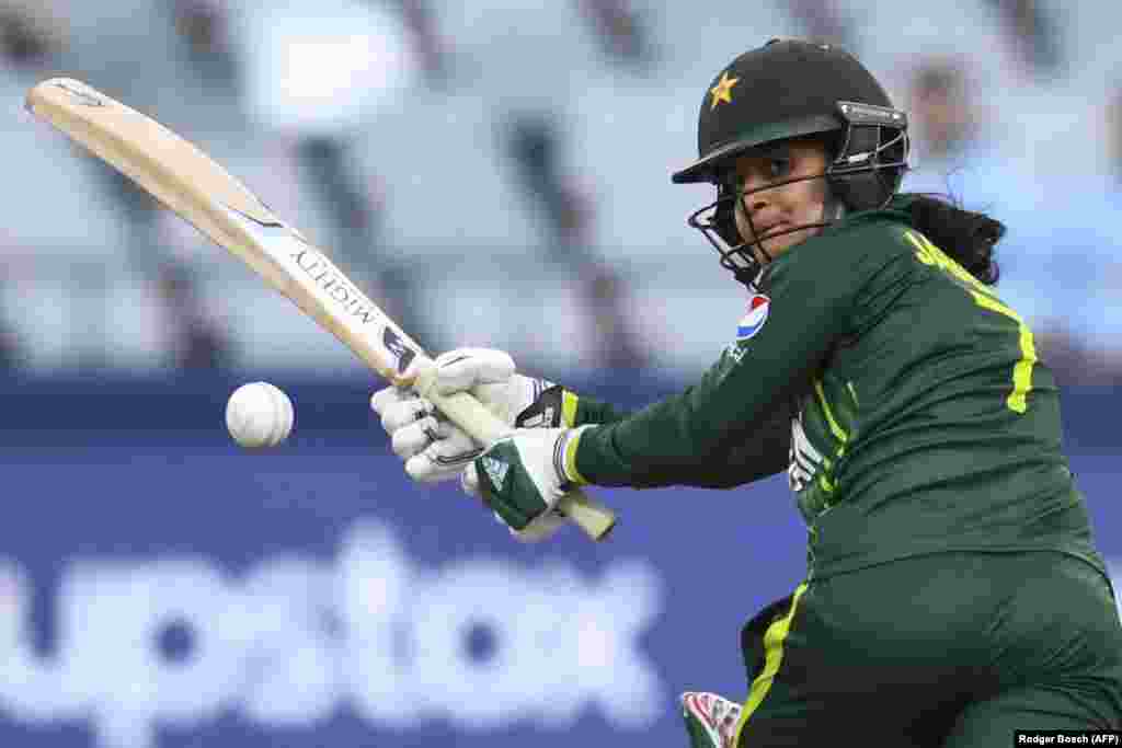 Pakistan&#39;s Javeria Wadood Khan watches the ball after playing a shot during the Group B T20 women&#39;s World Cup cricket match between Pakistan and Ireland at Newlands Stadium in Cape Town.