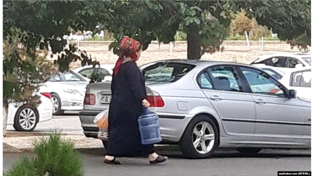 Amid water outages, people often go to neighboring towns in search of water.