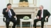 Televiziunea rusă de stat a transmis imagini de la întâlnirea celor doi la Kremlin, Putin fiind filmat în timp ce-i spune omologului său chinez: „Dragă prietene, bine ai venit în Rusia”.