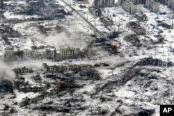 The ruins of the Ukrainian town of Maryinka are seen earlier this year following intense fighting with invading Russian forces.