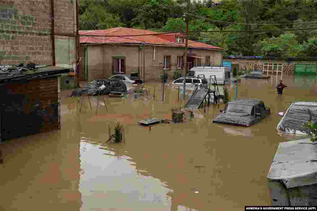 A handout picture released by Armenia&#39;s press service on May 26 shows flood-affected areas in northern Armenia. According to the minister of territorial administration and infrastructure, Gnel Sanosyan, there are 5,500 inhabitants cut off in isolated villages.