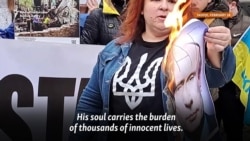 Putin's Portrait Burned Outside Russian Embassy In North Macedonia