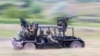 An &ldquo;anti-drone buggy&rdquo; being tested by Russian troops inside Ukraine in June 2024. The vehicle sports multiple automatic weapons mounted on a light chassis, and unspecified &ldquo;anti-drone weapons&rdquo; apparently fired from grenade launch tubes seen at the front and rear of the vehicle.