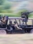 An &ldquo;anti-drone buggy&rdquo; being tested by Russian troops inside Ukraine in June 2024. The vehicle sports multiple automatic weapons mounted on a light chassis, and unspecified &ldquo;anti-drone weapons&rdquo; are apparently fired from grenade launch tubes seen at the front and rear of the vehicle.