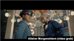 Morgernshtern (right) and Serik appear in the Russian hip-hop star's Black Russian video, shot at the Physics of the Sun Institute outside Tashkent.