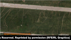 Російські гелікоптери на аеродромі Бердянська, окупованого російськими військами (Запорізька область). Супутниковий знімок Planet Labs, 13 червня 2023 року