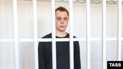 Nikita Zhuravel, 19, who publicly burned a Koran in the Russian city of Volgograd, was charged with "insulting believers' feelings" and "religious hatred-based hooliganism."