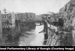 The Avlabarski Bridge, spanning the narrow point of the Mtkvari River as it runs through Tbilisi. The Soviet-made Metekhi Bridge at the base of Tbilisi’s old town now spans the river at this point.