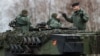 Polish instructors and Ukrainian soldiers train on Leopard 2 A4 tanks in the 10th Armored Cavalry Brigade in Swietoszow, Poland, on February 13.