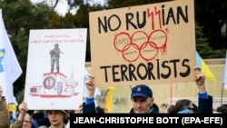 Протест в Лозана срещу участието на спортисти от Русия и Беларус в Олимпийските игри в Париж, 25 март 2023 г.