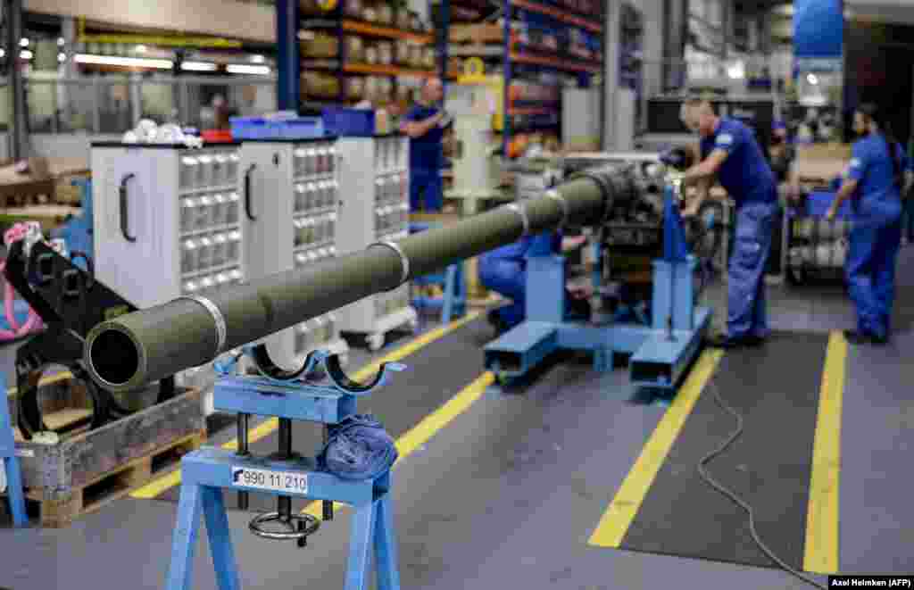 Technicians work on a 120mm cannon for Leopard battle tanks that will be delivered to Ukrainian forces.&nbsp; In May it was announced&nbsp;that Rheinmetall would link with Ukraine&#39;s state-run Ukroboronprom weapons company with a goal &quot;to jointly produce selected Rheinmetall products in Ukraine.&quot;