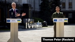 NATO Secretary-General Jens Stoltenberg (left) speaks at a news conference in Kyiv on April 29 with Ukrainian President Volodymyr Zelenskiy.