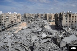 Развалини на къщи, разрушени от израелски бомбардировки в района на Хамад, западно от Хан Юнис в южната част на Ивицата Газа, на 14 март 2024 г.