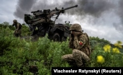 Ukrainian gunners fire from a Vampir rocket salvo system at Russian troop positions near the city of Avdiyivka in the Donetsk region. (file photo)