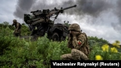 Ukrainian gunners fire from the "Vampir" rocket salvo system at positions of Russian troops near the city of Avdiyivka, Donetsk region, on May 31.