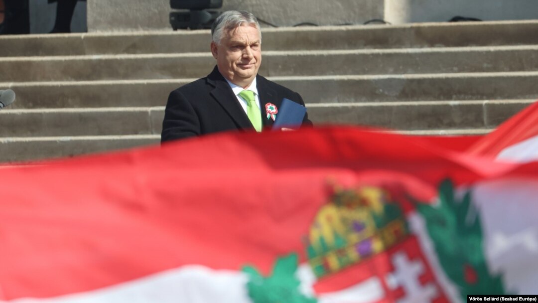 Hungarian Prime Minister Viktor Orban: hiding behind the flag? 