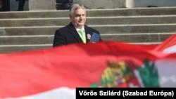 Hungarian Prime Minister Viktor Orban: hiding behind the flag? 