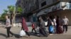 Qytetarë palestinezë duke u larguar në zona më të sigurta në Gazë. Tetor, 2023.