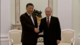 grab Chinese President Xi Jinping and Russian President Vladimir Putin