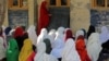 Afghan girls attend their classes at a primary school in Bati Kot, a rural district in the eastern province of Nangarhar.