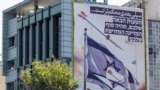 دیوارنوشتهٔ تبلیغاتی در خیابانی در تهران، پس از حملهٔ موشکی و پهپادی به اسرائیل