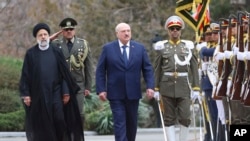 Прэзыдэнт Ірану Ібрагім Раісі (зьлева) і Аляксандар Лукашэнка. Тэгеран, 13 сакавіка 2023 г.